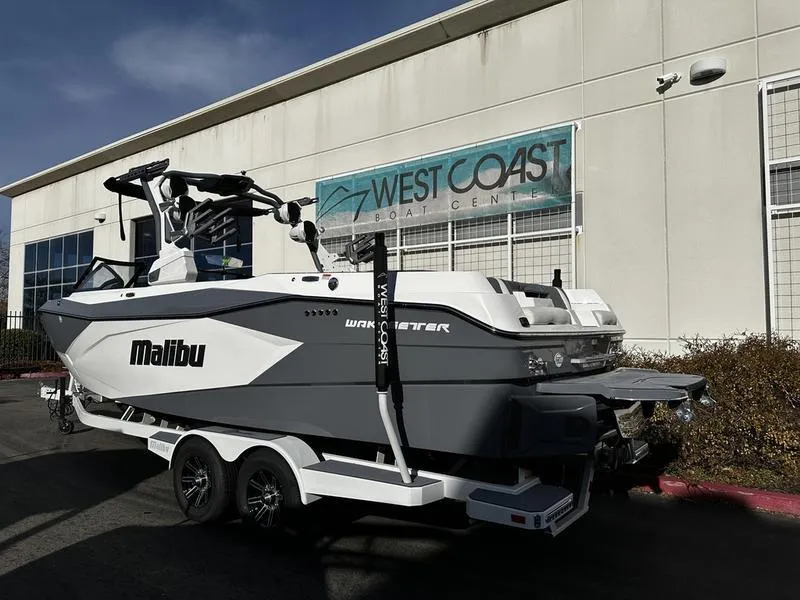 Slide: The Image of 2025 Malibu Wakesetter 26 LSV boat at West Coast Boat Center. - 2