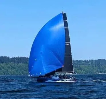 Slide: The Image of Sailing yacht Offshore Racing Van Munster Boats Fred Barrett 35, 2016, with a vibrant blue spinnaker. - 24