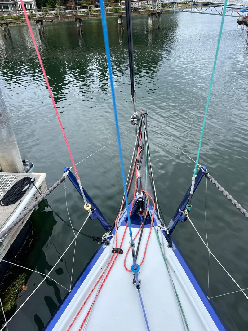 Slide: The Image of 2016 Offshore Racing Van Munster Boats Fred Barrett 35 sailboat, docked with colorful rigging. - 25