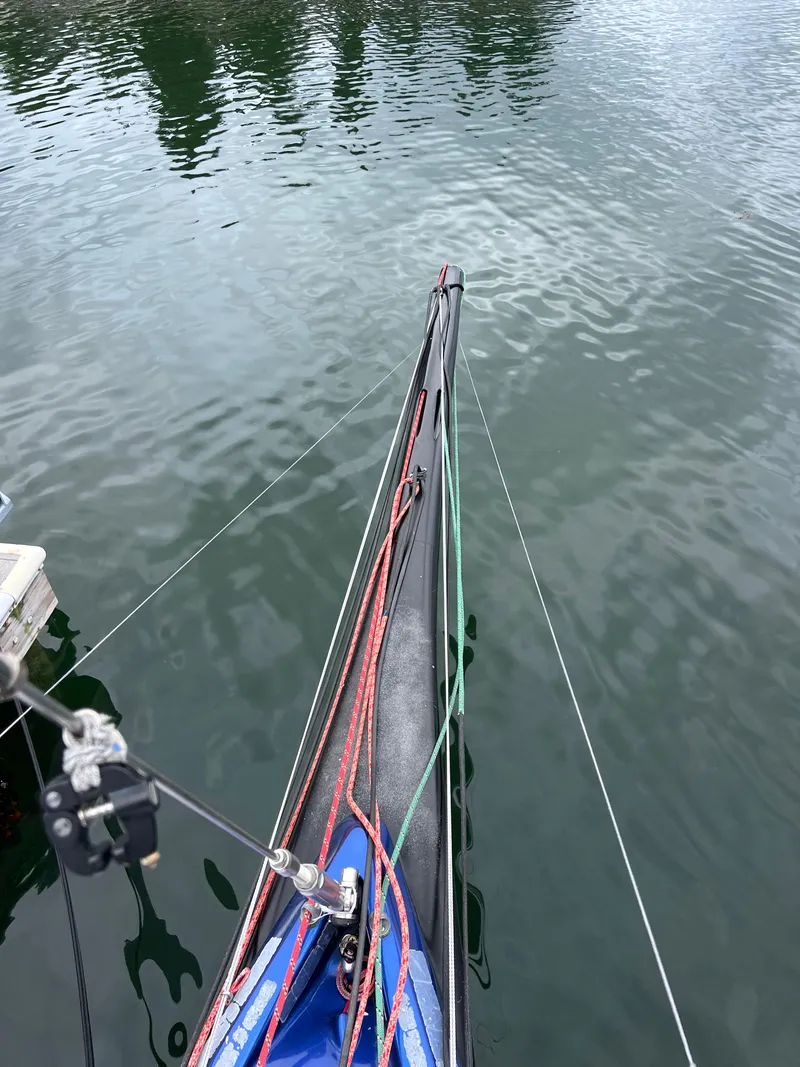 Slide: The Image of 2016 Offshore Racing Van Munster Boats Fred Barrett 35, view of bow and rigging on water. - 26