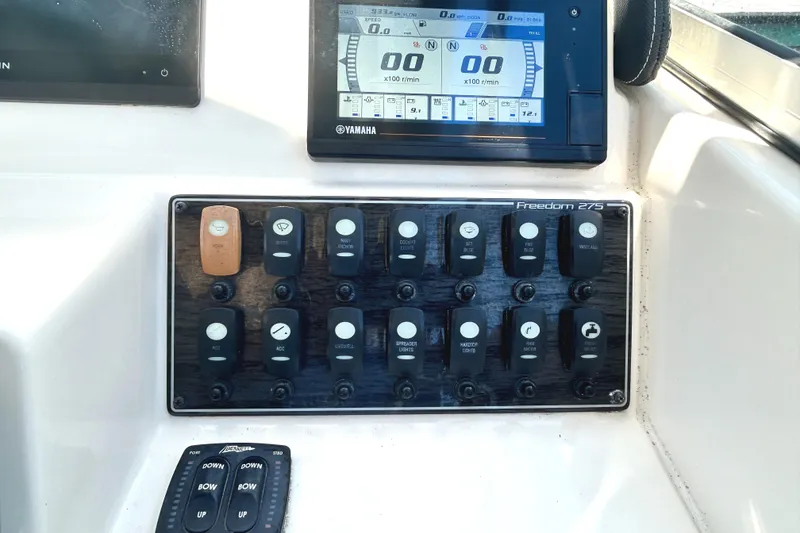 Slide: The Image of Control panel of 2020 Grady-White Freedom 275 boat with Yamaha display. - 11