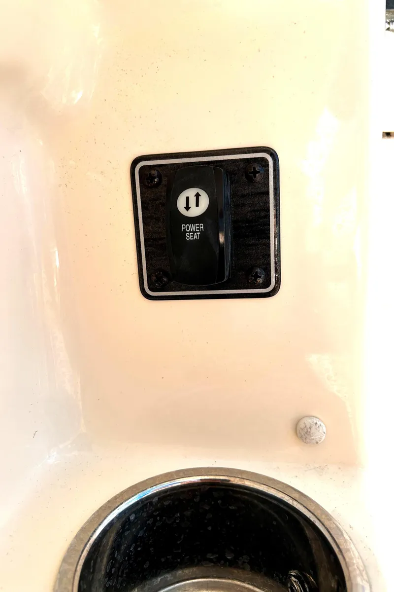 Slide: The Image of Power seat switch on 2020 Grady-White Freedom 275 boat. - 28