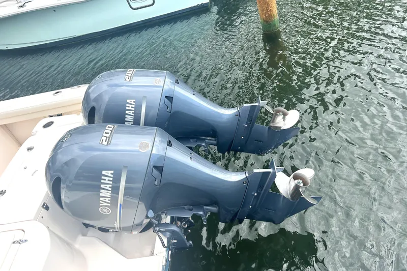Slide: The Image of Twin Yamaha outboard engines on a 2020 Grady-White Freedom 275 boat. - 3