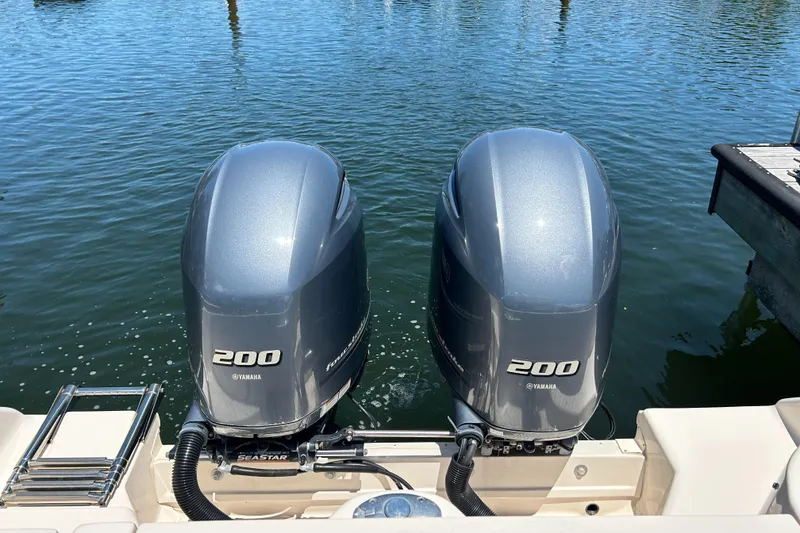 Slide: The Image of Twin Yamaha 200 outboard engines on a 2020 Grady-White Freedom 275 boat. - 4