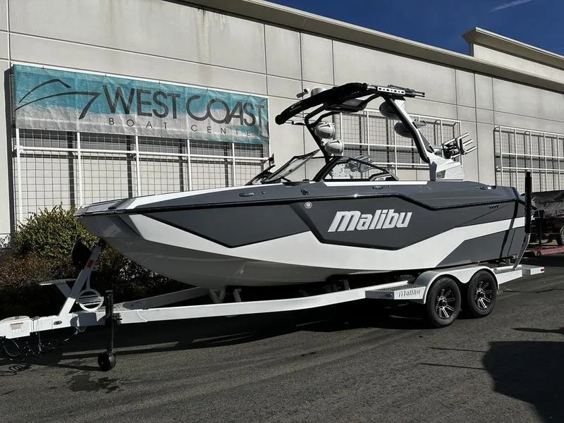 The Image of 2025 Malibu M230 boat on trailer at West Coast Boat Center. - 0