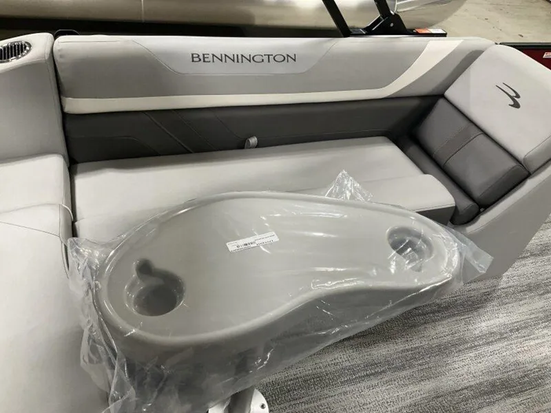 Slide: The Image of 2025 Bennington 24 SXSB boat interior with seating and table. - 20