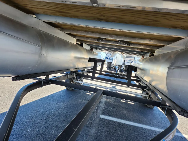 Slide: The Image of Underneath view of 2022 Crest Classic LX 200 pontoon boat on trailer. - 7