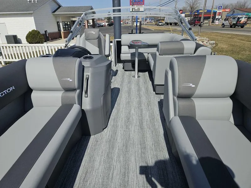Slide: The Image of 2025 Bennington 188 SL pontoon boat with sleek gray seating and modern design. - 6