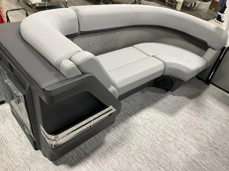 Slide: The Image of Bennington M Quad Bench 22 MFB 2025, luxurious gray seating on a boat deck. - 10