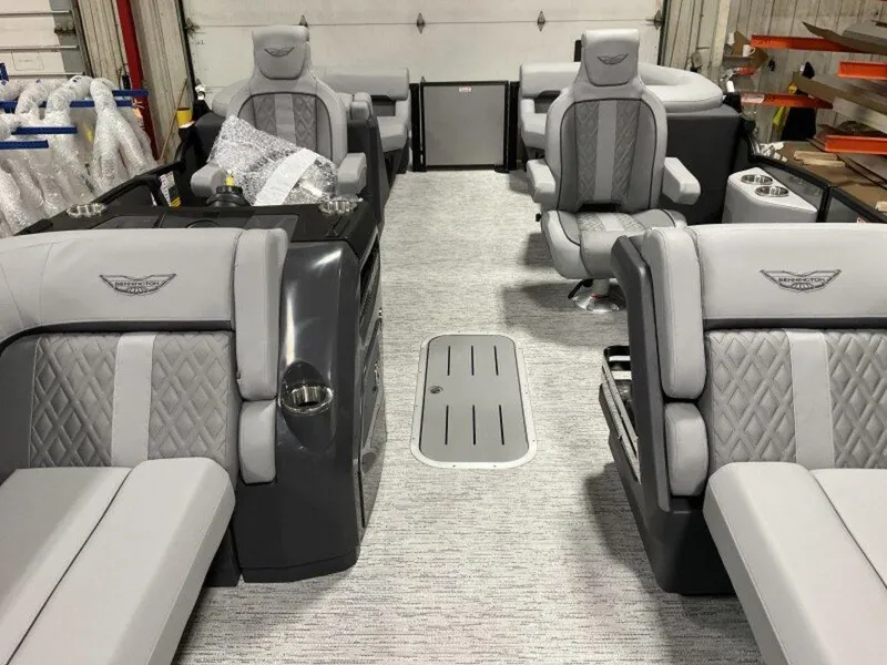 Slide: The Image of 2025 Bennington M Quad Bench 22 MFB interior with luxurious gray seating and modern design. - 20