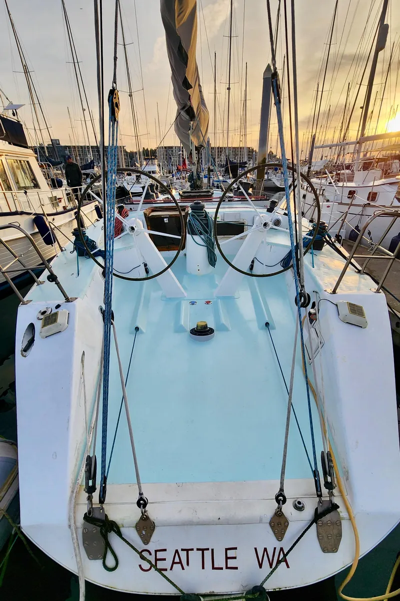 Slide: The Image of 1985 Farr 50 sailboat docked at sunset, Seattle marina. - 6