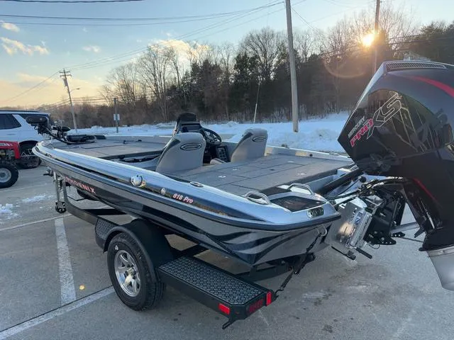 Slide: The Image of 2025 Phoenix 818 Pro boat with powerful engine, parked outdoors in snowy setting. - 15