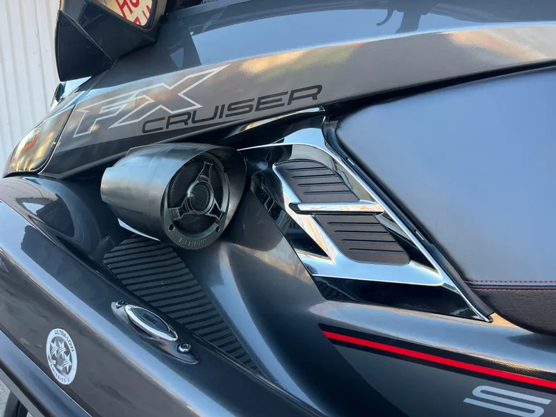 Slide: The Image of 2018 Yamaha WaveRunner FX Cruiser SVHO, close-up of sleek design and speaker detail. - 12