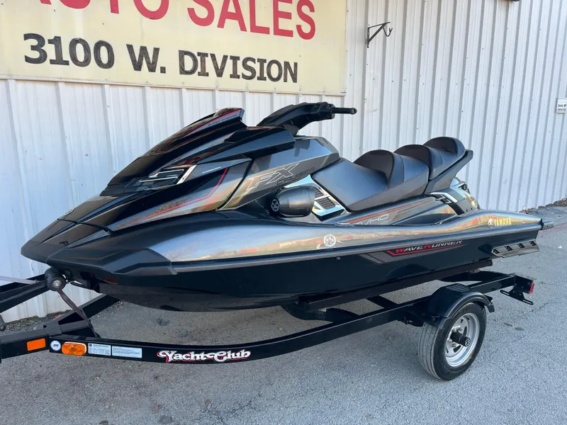 Slide: The Image of 2018 Yamaha WaveRunner FX Cruiser SVHO on trailer, parked outside dealership. - 2
