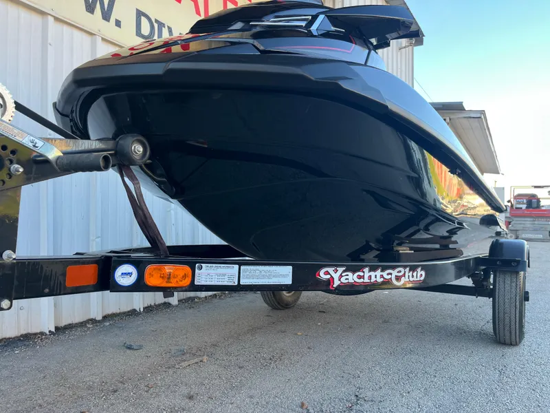 Slide: The Image of 2018 Yamaha WaveRunner FX Cruiser SVHO on trailer, black exterior, side view. - 6