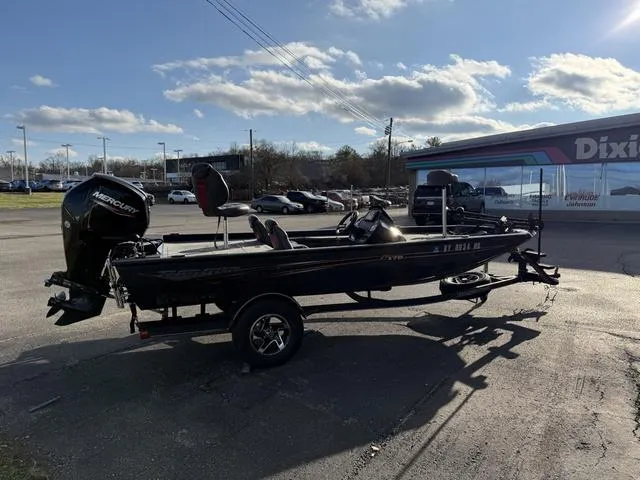 Slide: The Image of 2021 Ranger RT178 boat with Mercury engine parked outdoors near dealership. - 5