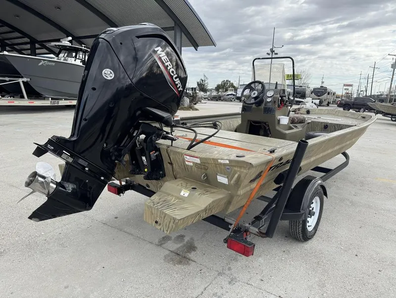 Slide: The Image of 2020 Tracker Grizzly 1860 CC boat with Mercury outboard motor on trailer. - 6