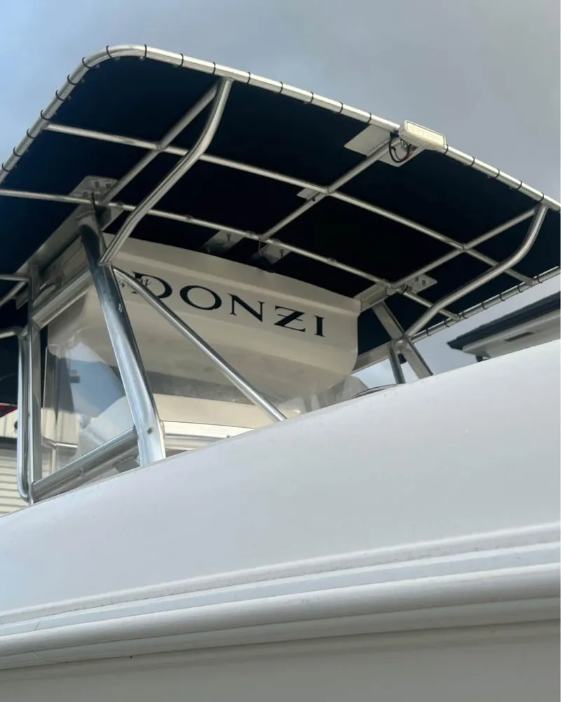 Slide: The Image of 2001 Donzi 32 ZF Open boat with canopy, viewed from below. - 16