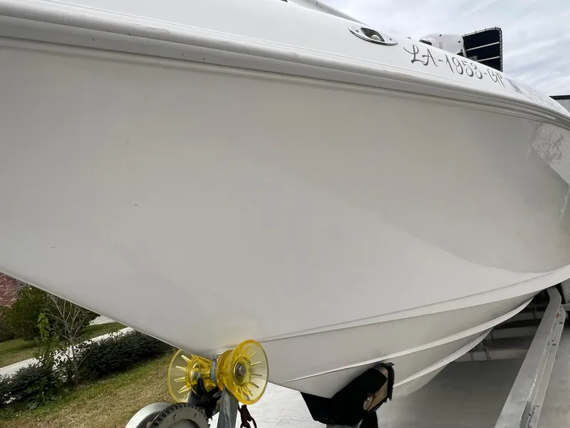 Slide: The Image of 2001 Donzi 32 ZF Open boat on trailer, close-up view of hull. - 23