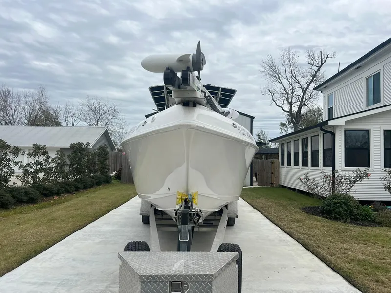 Slide: The Image of 2001 Donzi 32 ZF Open boat on trailer, parked in residential driveway. - 3