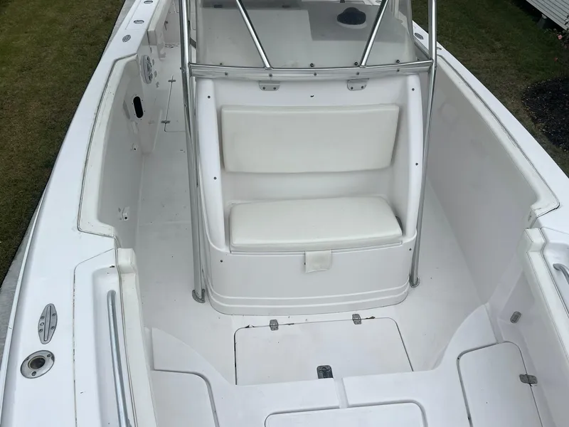 Slide: The Image of 2001 Donzi 32 ZF Open boat interior with white seating and console. - 37