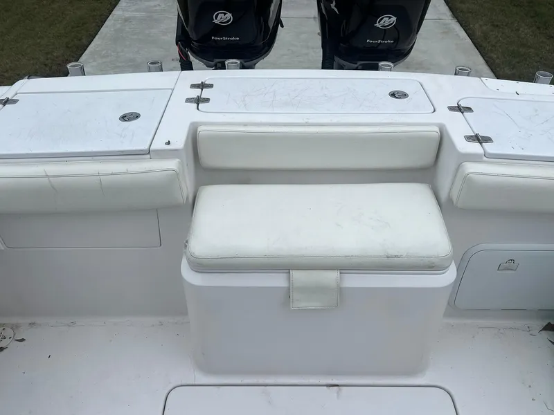 Slide: The Image of 2001 Donzi 32 ZF Open boat interior with seating and dual Mercury engines. - 43