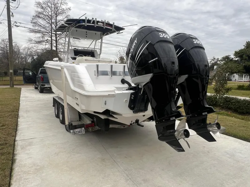 Slide: The Image of 2001 Donzi 32 ZF Open boat with twin Mercury 300 engines on a trailer. - 8