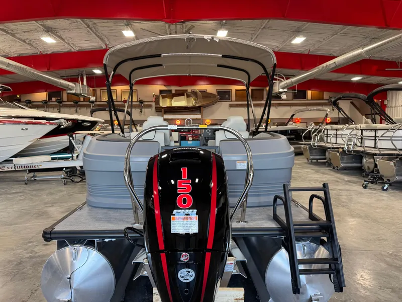 Slide: The Image of 2025 Sylvan A-22 Sport boat with 150 HP engine in showroom. - 5