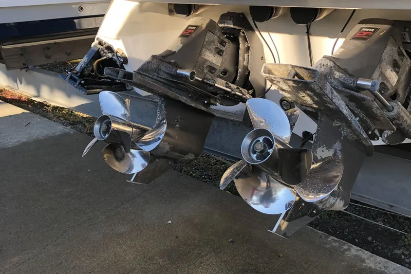 Slide: The Image of Dual propellers on a 2005 Cobalt 360 boat, showcasing polished metal finish. - 13