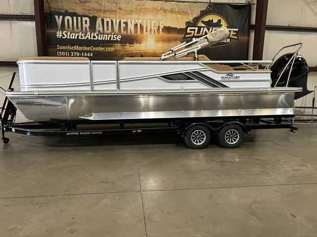 Slide: The Image of 2025 SunCatcher Fusion Series 324SS pontoon boat with Yamaha 250 "SHO" engine on trailer. - 1