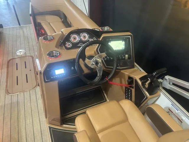 Slide: The Image of 2025 SunCatcher Fusion Series 324SS boat interior with Yamaha 250 "SHO" controls and dashboard. - 16