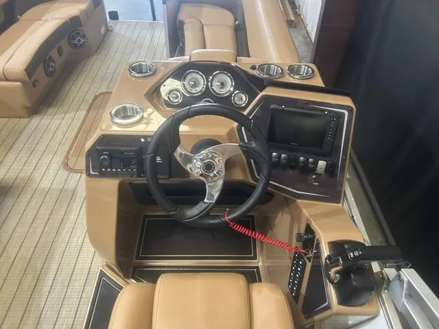 Slide: The Image of 2025 SunCatcher Fusion Series 324SS boat dashboard with Yamaha 250 "SHO" controls. - 17