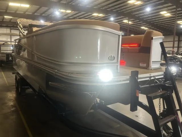 Slide: The Image of 2025 SunCatcher Fusion Series 324SS boat with Yamaha 250 "SHO" engine in a warehouse setting. - 3