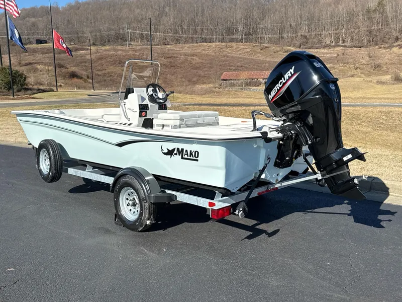 Slide: The Image of 2025 Mako Pro Skiff 17 CC boat with Mercury engine on trailer. - 3