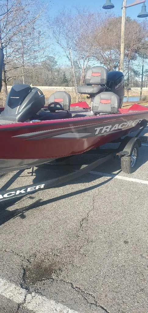 Slide: The Image of 2025 Tracker Pro Team 175 Crappie Edition boat in parking lot. - 5