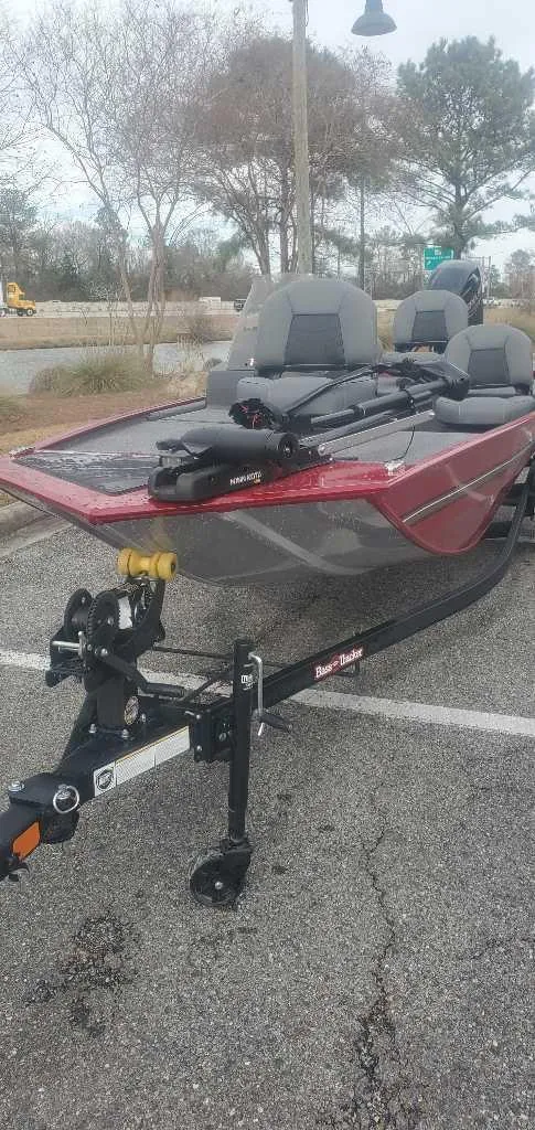 Slide: The Image of 2025 Tracker Bass Tracker Classic XL boat on trailer, parked outdoors. - 4