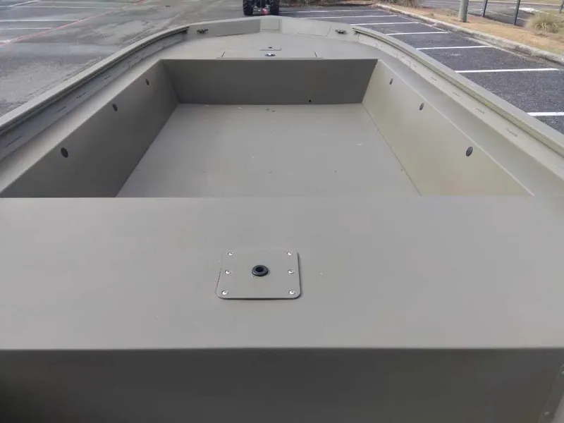 Slide: The Image of 2025 Tracker Grizzly 1754 Jon boat interior, empty and ready for customization. - 11