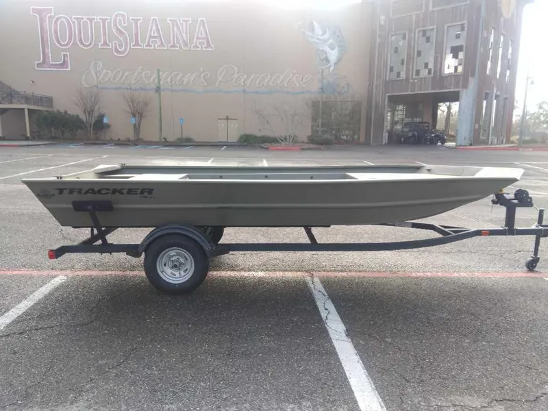 Slide: The Image of 2025 Tracker Grizzly 1754 Jon boat on trailer in parking lot. - 4