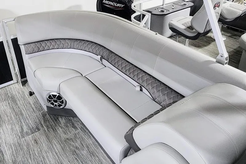 Slide: The Image of 2025 Ranger Reata 243C boat interior with luxurious seating and modern design. - 13