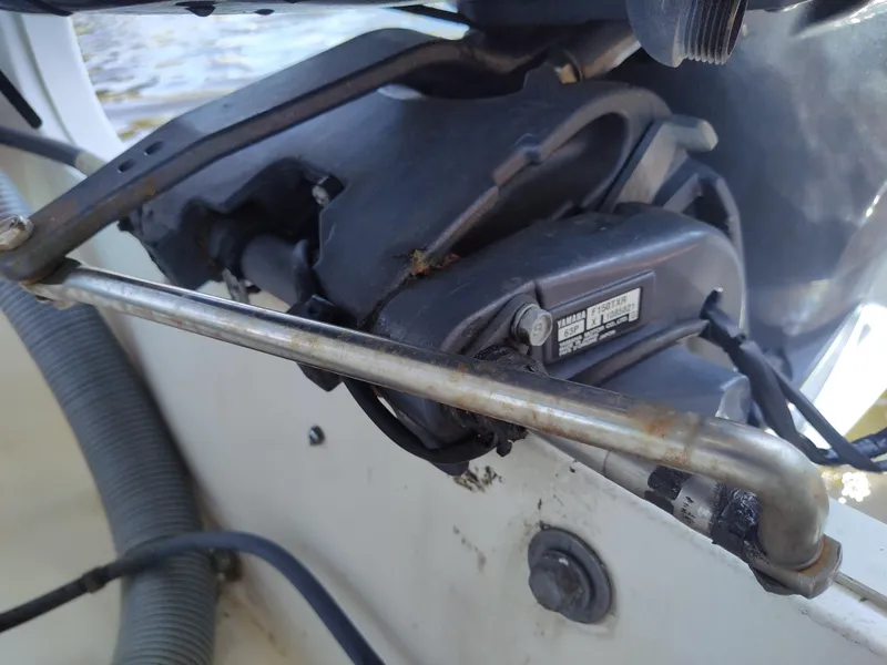 Slide: The Image of Close-up of a 1994 Pursuit 2150 DC boat engine component. - 6