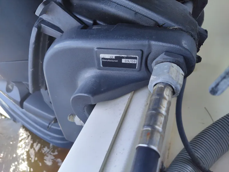 Slide: The Image of Close-up of a 1994 Pursuit 2150 DC boat component with manufacturing label. - 7