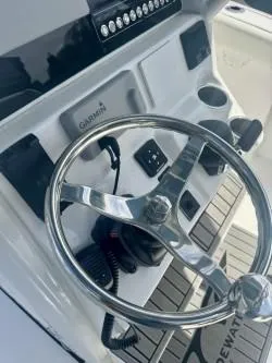 Slide: The Image of Steering console of 2025 Tidewater 232 LXF boat with Garmin electronics. - 7