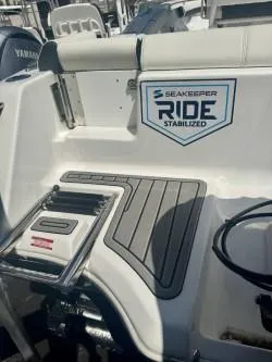 Slide: The Image of 2025 Tidewater 232 LXF boat with Seakeeper Ride stabilization system. - 8