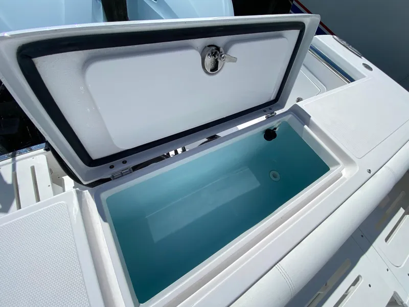 Slide: The Image of Open storage compartment on 2017 Southport 33 LX boat. - 20