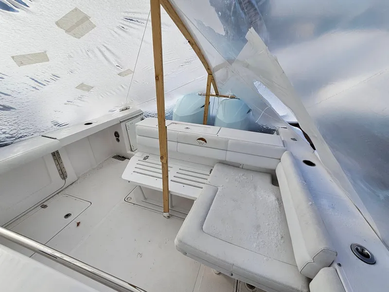 Slide: The Image of 2017 Southport 33 LX boat interior under protective cover. - 5