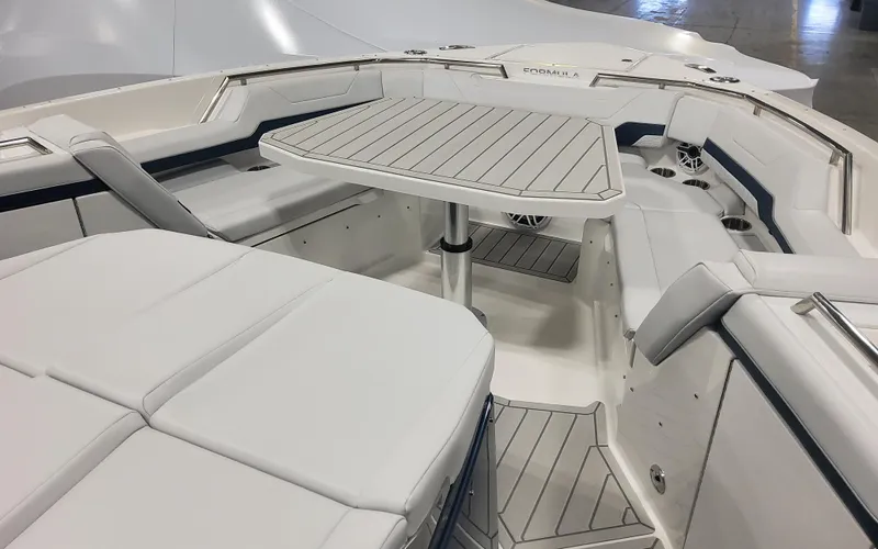 Slide: The Image of 2025 Formula 387 Center Console Fish boat interior with seating and table. - 10