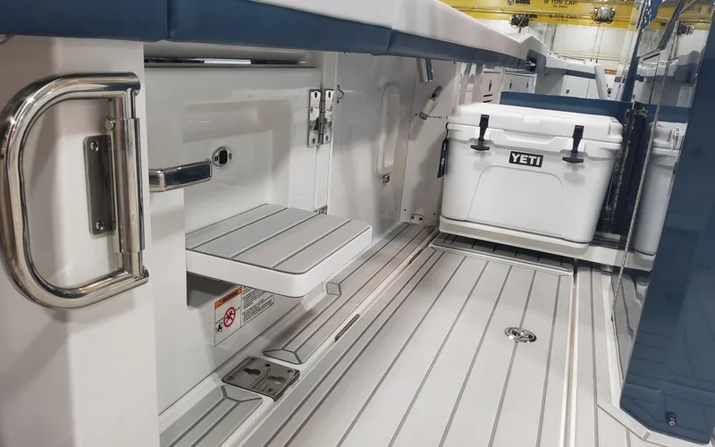 Slide: The Image of 2025 Formula 387 Center Console Fish interior with Yeti cooler and seating. - 17