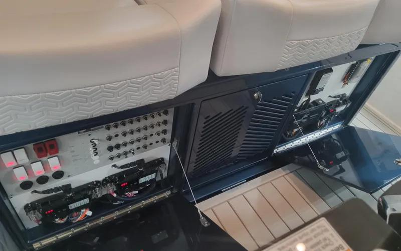 Slide: The Image of 2025 Formula 387 Center Console Fish boat interior with control panel and seating. - 18