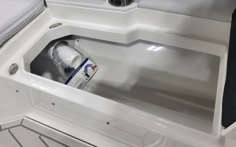 Slide: The Image of 2025 Formula 387 Center Console Fish storage compartment with safety equipment. - 9