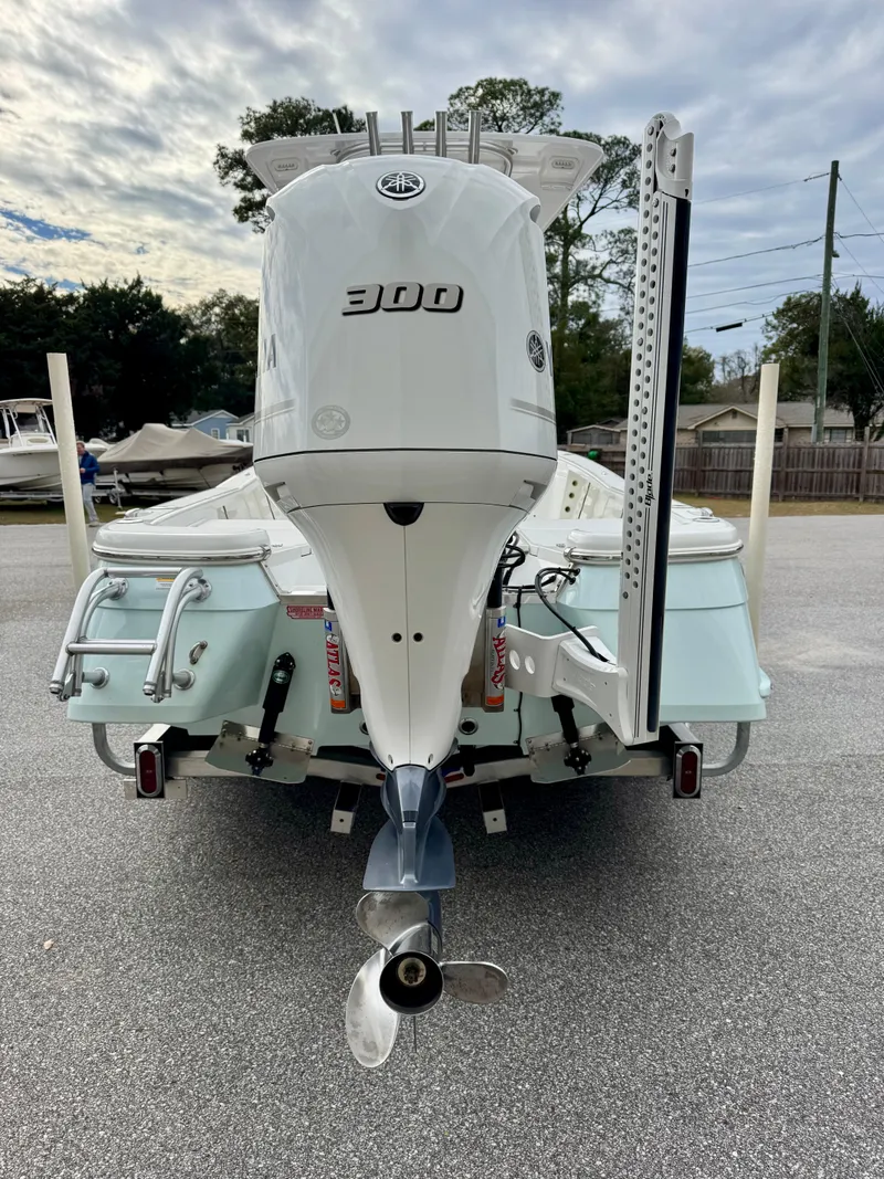 Slide: The Image of 2020 BlackJack 256 Bay boat with powerful 300 engine, rear view. - 5